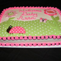 Lady Bug Baby Shower Cake Cake is 13 x 9 buttercream with fondant decorations based on the Miss Ladybug's Garden bedding at Baby Gap