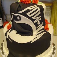 Mia/pow Cake This cake did not turn out the way I hoped but I had to make it work. The drapes (flags) decorations were too heavy and made them tear.....