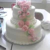 Wilton Course 3 Final Cake This was my Wilton's Course 3 Final Cake... it was chocolate and red velvet cake, marshmellow fondant and buttercream icing.