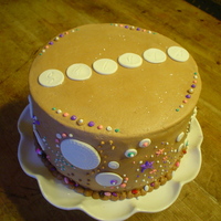 Craziness Chocolate cake for my mother-in-law. I baked 3 10 inch chocolate cakes & filled with coconut pecan filling. Frosted with chocolate...