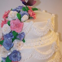 Butterfly & Flowers I made the flowers and the butterfly out of gum paste. The cake is made with a Swiss meringue buttercream.