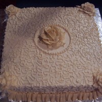 Bridal Shower The cake is a 14" square cake with double layers, the frosting is a ivory swiss meringue buttercream.