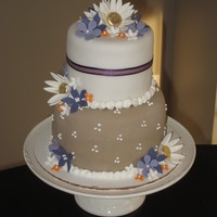 Purple And Orange Brides Cake This cake was a last minute (about 3 hours before) companion to the masculine themed groom's cake served at the rehersal dinner. The...
