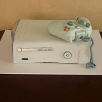 Xbox Groom's Cake Done to scale, except the controller came out a little larger. Controller is cereal treats covered in fondant and gumpaste. Cake is covered...