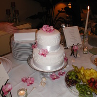 Small White Wedding Cake 2 tier fondant with royal and ribbon. Old pic of my first cake, ever!