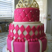 Pink And White Princess Cake This was probably my biggest cake and challenge. MMF with a crown on top made from white chocolate (: