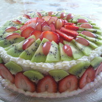 Fruit Cake A simple cake I made with buttercream and designed the outside with fresh fruit. Enjoy (: