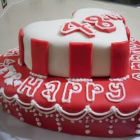 Red And White Anniversary Cake Just a little cake my friend's mom wanted to celebrate her parents 48th anniversary shaped into 2 hearts with fondant. Hope you like...