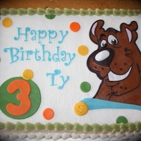 Scooby Birthday This cake is made to match the invitations. Scooby is made from fondant.