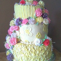 Mother's Day Flowers My biggest cake to date! Orange, tiramisu and marble cheesecake flavored cakes, cut topsy turvy (though with all the flowers it's...