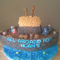 Noah's Cake I love this cake! Carved from a football pan and a 9x13, covered and decorated in fondant. "water" is buttercream with piping gel...