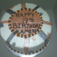 19Th Birthday Cake Banana cake filled with a banana, vanilla cream and fresh bananas frosted with whipped cream. Fondant accents painted with sliver dust....