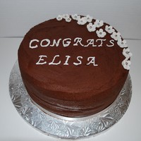 Chocolate Mousse Graduation Cake chocolate cake with chocolate mousse and chocolate fudge between layers. Dark chocolate buttercream with gumpaste flowers with dragees. My...