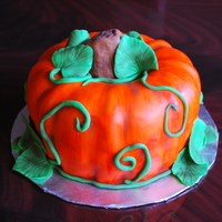 Pumpkin Cake I used my bundt pan for this:) SW golden butter cake with buttercream under fondant. Painted the fondant with wilton orange mixed with...