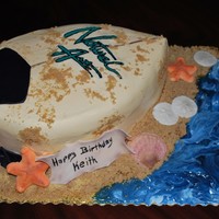 Surfboard Cake Cake is dark chocolate and french vanilla buttercream. The lettering is my first attempt at a frozen buttercream transfer. The shells are...