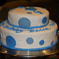 Fourth Birthday Cake This is my first fondant and stacked cake. Cake was yellow butter cake with vanilla pudding filling. I used buttercream for piping and the...