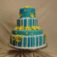 Blue Daisy My wedding cake for the Utah state fair competition 2010. The daisies are all hand made from gum paste.