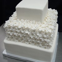 Simply White this is a 3 tier square i made. i love how the middle tier turned out! couldnt stop staring at the flowers! the cherry blossoms were made...