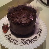 Mother's Day Cake For My Mom Found a really good combination! Devil's food cake, fresh whipped cream and sliced strawberry filling, covered in ganache, YUM! After...