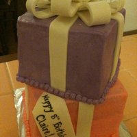 Is Their A Barbie In There? 2 Tiered present cake, bc with fondant bow, really like the bow tutorial from expert village on youtube