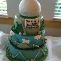 Fun Fundraising Golf Cake Biggest challange ever! 3 tiers with edible ball on top. Everything is edible. Please feel free to ask any questions!