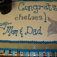 Graduation Cake Not the best picture of this cake but it was HUGE! 2 layer marble cake with cookie dough filling (recipe on cakecentral.com) Was a big big...