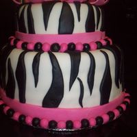 Zebra Birthday Cake This cake was ordered for a Birthday. The bottom tier is Red Velvet with Chocolate Geneche fresh raspberries and the top tier is french...
