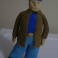 Little Man This is my first attempt to make a person with gumpaste. He stands 6 inches tall and will go on an airplane cake later this week. Thanks...