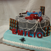 Spiderman Cake Royal icing details and gumpaste, the buildings made out of chocolate bars. TFL