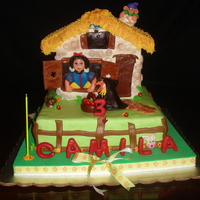Snow White Cake This cake was fun to do. Cottage made out of styrofoam and covered in gumpaste. TFL