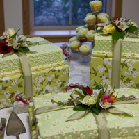 "the Gift" "The gift" I truly believe that my husband was a gift from God...so our cakes were gifts as well. 3 cakes all different flavors...