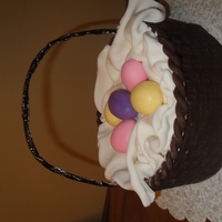 Easter Basket I was inspired by shugarshack's basket cake. White cake with white chocolate ganache filling and MMF. My gumpaste handle broke so I...