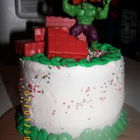 The Hulk This cake was done for my son.It was a white 8in round cake, double layered.The action figure was poseable.
