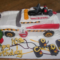 Ghostbusters' Ecto-1 Neighbor's son wanted this for his birthday.Cake was Buttery Yellow with Cool-Whip based frosting, Decorations were done in rolled...