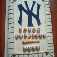 Yankee Baseball Cake I rushed this cake for my nephews 10th Birthday. I am happy with the way it came out... It's buttercream (something I am new to - I&#...