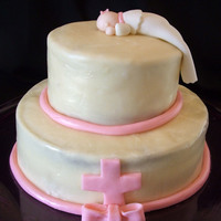 Sleeping Baby This was actually for a Baptism. It my first cake covered in homemade white modeling chocolate. (Next time I will make the chocolate...