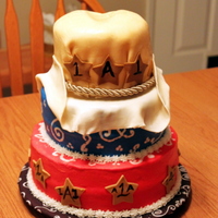 Cowboy Cake Cake: WhiteFilling: French VanillaHat: fondant/gumpasteOccasion: 1st Birthday