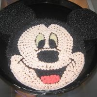 My First Cake Ever! This is my first ever attempt at cake design. It is a 2 layer yellow cake with strawberry filling and buttercream icing. My 3 year old...