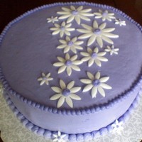 Purple W/ White Daisies Buttercream icing with fondant daisies
