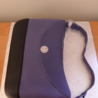 Purple Purse I made this for a friend's bachelorette party. It traveled on the train for 5 hours with the bride's sister but arrived in good...