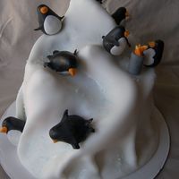 Penguin Party Iceberg sporting some partying penguins. Warming by the drum fire and sliding down the slippery ice.