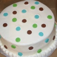 Mom To Be Cake This was fun to do! I made the cake covered in buttercream with fondant dots and then added the dots on the cupcakes to match. I got the...