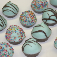 Cupcake Bites! Cupcake bites that were for a bridal shower. Inside is double chocolate cake w/ vanilla buttercream icing. Dipped in choc/white choc....