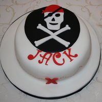 Pirate Birthday Sponge covered in fondant. Boy's only pirate party, one cake saved for school the next day with a slight change to incorporate both...