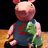 Peppa Pig - George Peppa Pig's Little Brother George, Head arms,legs and dinosaur made from RKTBody is all cake covered in Fondant.