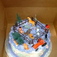 Down On The Farm this was a milk chocolate cake from scratch with buttercream frosting. Decorated on top with rosettes and plastic farm animals at the...