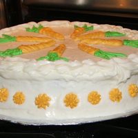 Carrot Cake this was a carrot cake made for a dinner party in a springform pan, torted and filled with chream cheese frosting. Iced in cream cheese...