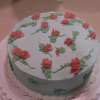 Final Cake - Wilton Course Level 1 I had wanted to incorporate more flowers that I had learned, including the rose - but do to high humidity (97%) the icing would NOT...