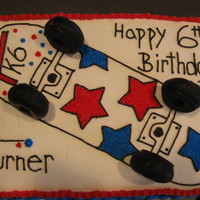 Skateboard Cake This was for my son's 6th birthday party with his friends. He told me he wanted a skateboard with red, white and blue. I created the...