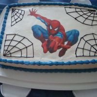 Spiderman buttercream icing with spiderman icing image